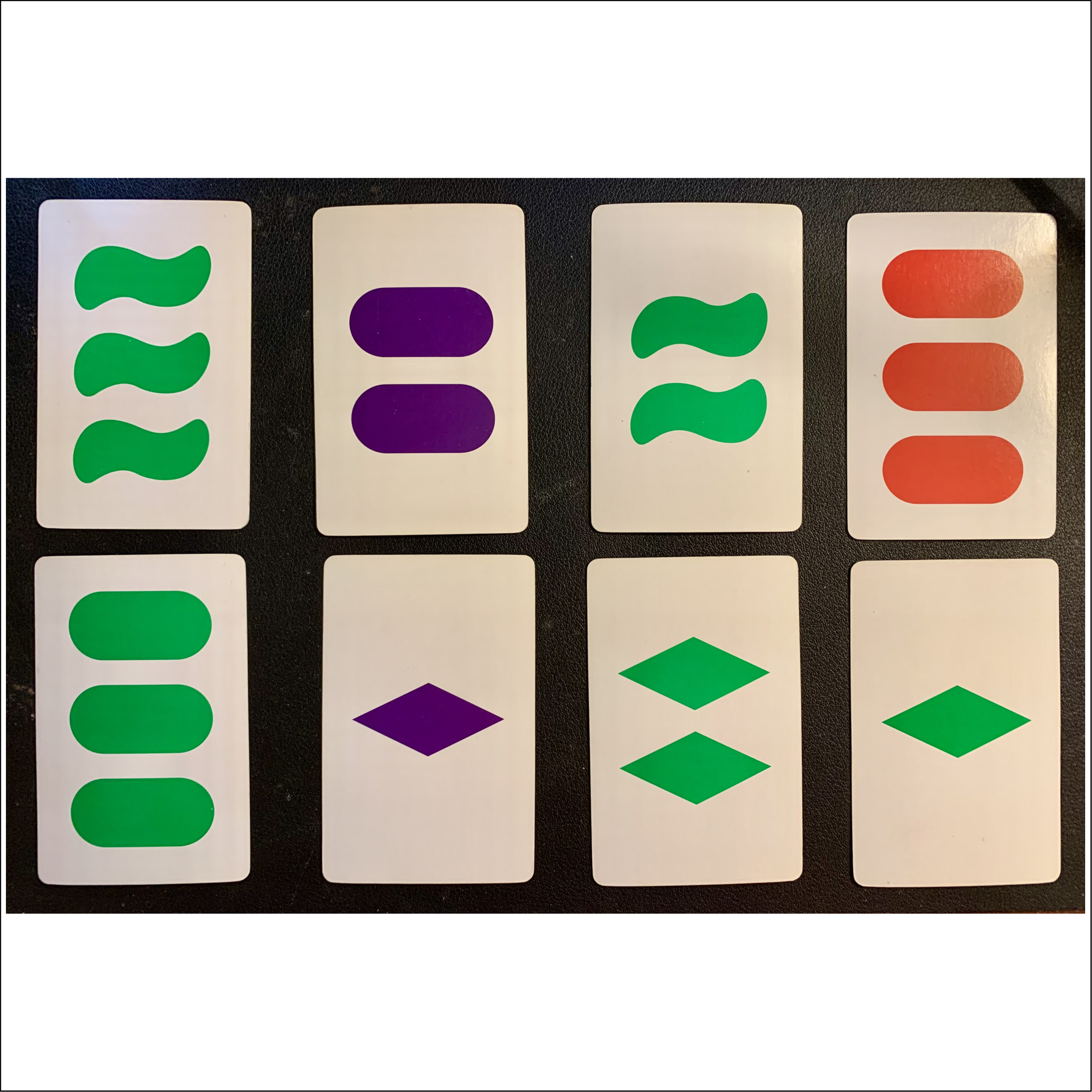 Game Idea: Set Uno, I.E. 4-Dimensional Uno with Non-Arbitrary Cards